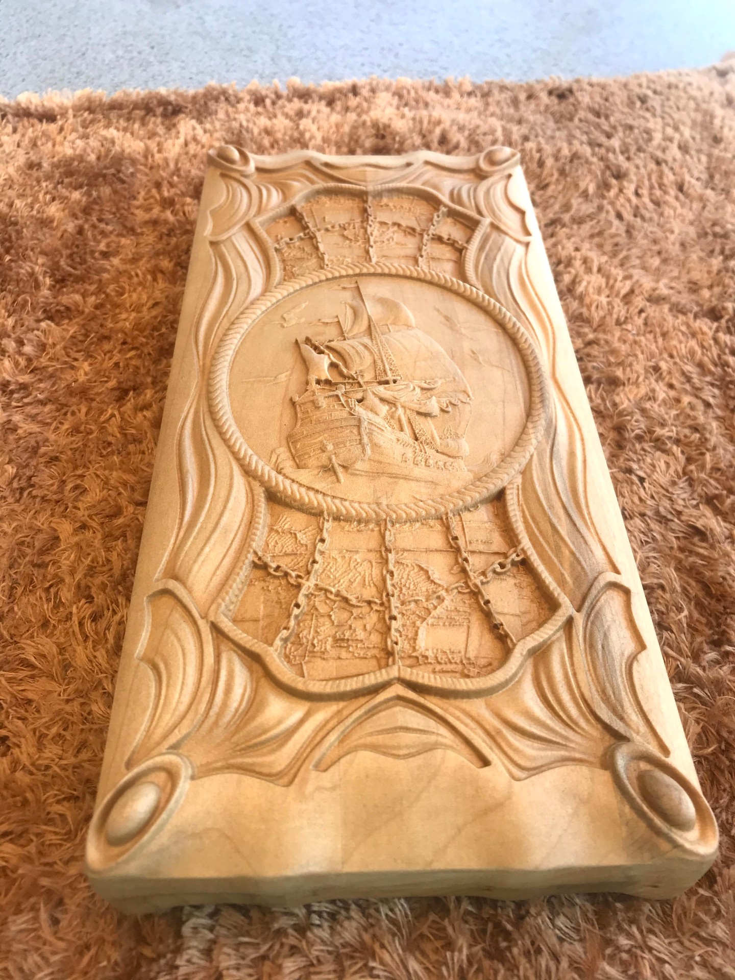 Floral relief carving in light material